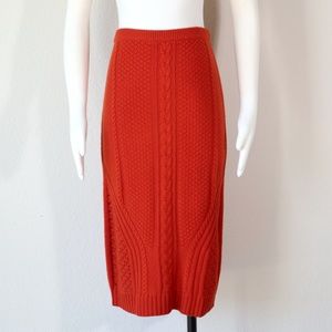 Burnt orange below-the-knee sweater skirt